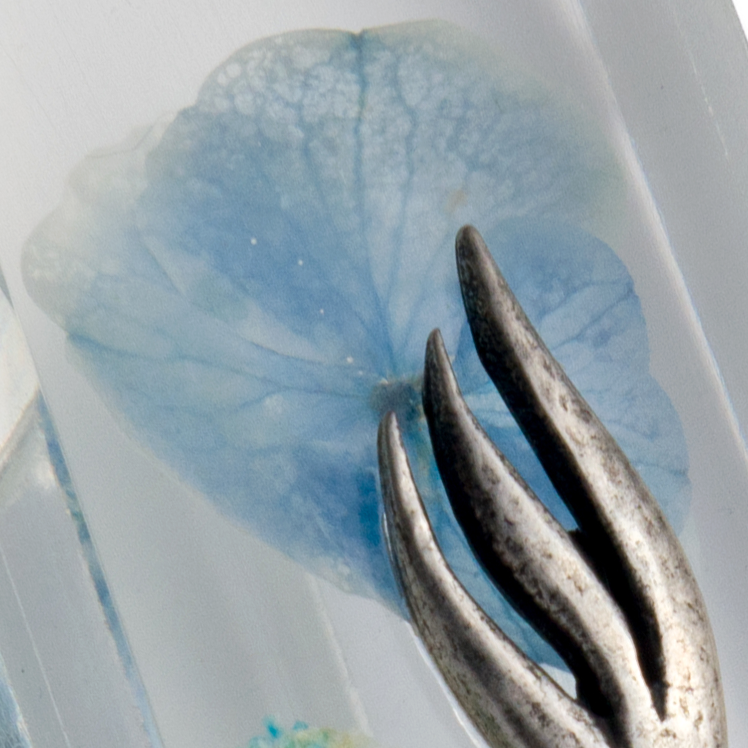 Handmade Mezuzah Case with Blue Flowers and Resin Close-up 