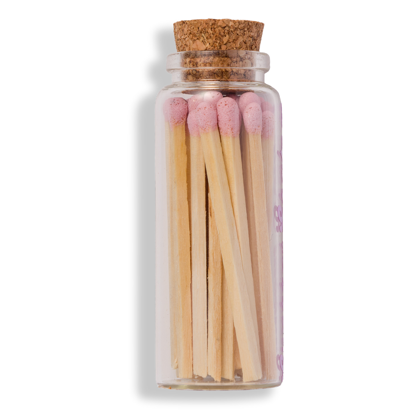 Handmade glass jar with cork lid filled with pink-tipped matches, labeled “Shabbat Shalom” 