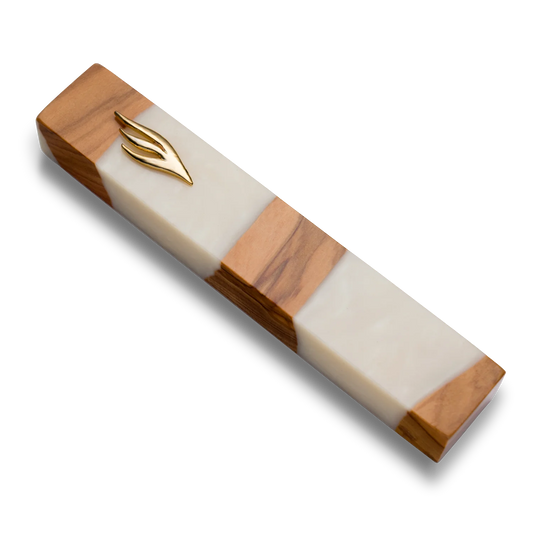 Handmade mezuzah crafted from olive wood and white resin, featuring a gold Shin symbol on the front.