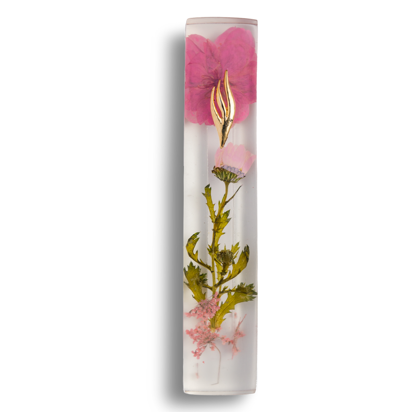 Handmade mezuzah crafted from clear resin and pink preserved flowers, featuring a golden Shin symbol on the front.
