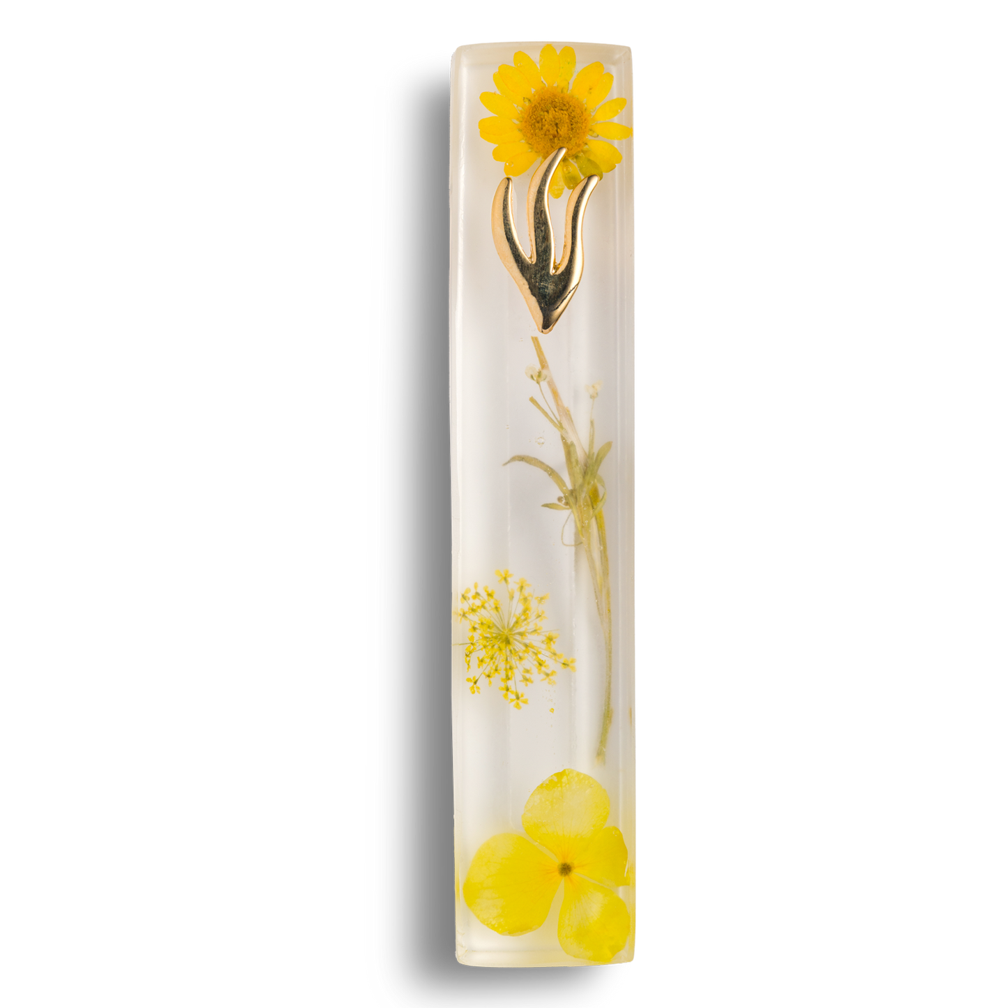 Handmade mezuzah crafted from clear resin and yellow preserved flowers, featuring a golden Shin symbol on the front.