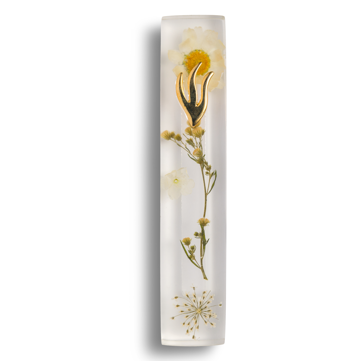 Handmade mezuzah crafted from clear resin and white preserved flowers, featuring a golden Shin symbol on the front.