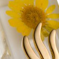 Handmade Mezuzah Case with Yellow Flowers and Resin Close-up 