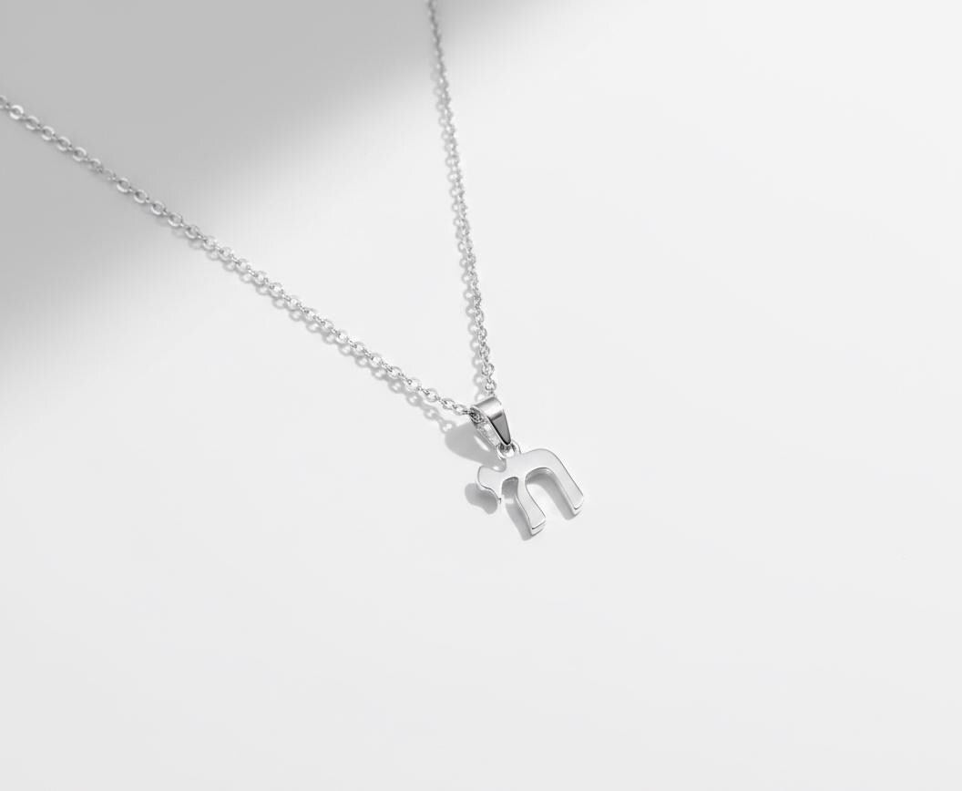Stainless steel Chai pendant, close-up