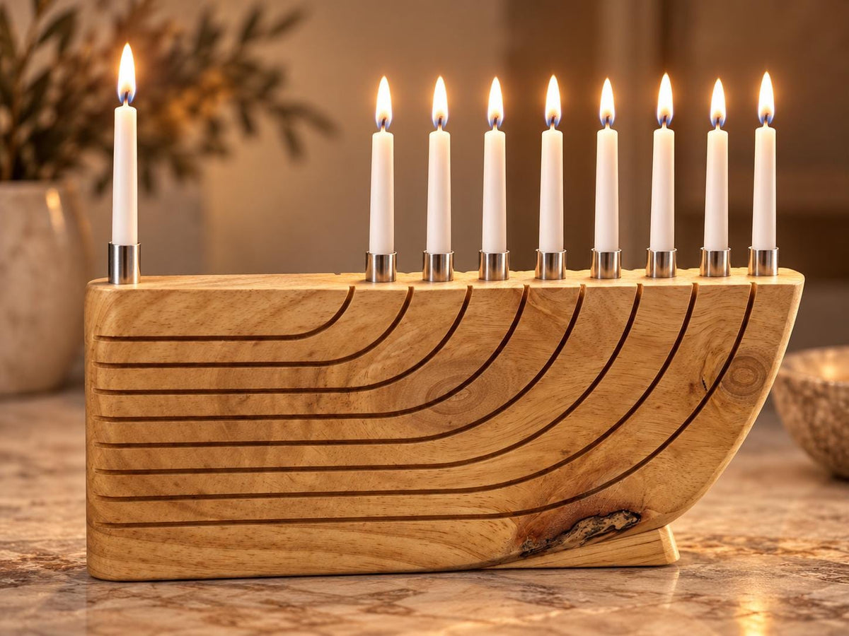 Wooden hanukkiah on a table at night